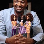 Taofick Okoya poses with his Queens of Africa dolls. (Photo: Isaac Emokpae)