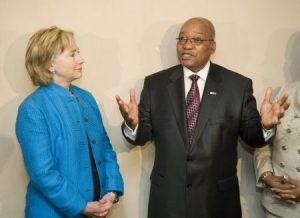 File Picture:U.S. Secretary of State Hillary Clinton (L) watches as South Africa's President Jacob Zuma speaks during a photo call after a brief meeting in Durban, August 8, 2009