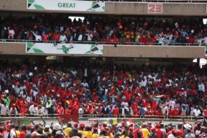 Tens of thousands of supporters of President Uhuru Kenyatta thronged to Kasarani Stadium in Nairobi to witness the launch of Jubilee Party, Sept. 10, 2016. (M. Yusuf/VOA)