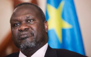 South Sudanese rebel leader Riek Machar left the country following violent clashes last month and is now in a "safe" country in the region, his aides say (AFP Photo/Zacharias Abubeker)