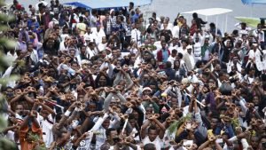 In a scene from Sunday, Oct. 2, festival-goers chant slogans against the government during a march in Bishoftu, Ethiopia. A week of violence prompted the country to declare a state of emergency. AP