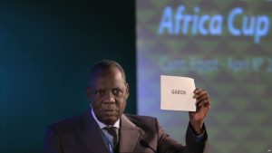 FILE - President of the Confederation of African Football, Issa Hayatou, announces that Gabon will be hosting the 2017 African Cup of Nations, April 8, 2015.