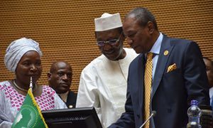 President Idriss Déby of Chad, centre, hands over to President Alpha Condé of Guinea, right, with the former head of the AU, Nkosazana Dlamini-Zuma, left, at the summit in Addis Ababa, Ethiopia. Photograph: Courtesy Africa Union