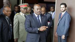 FILE - Democratic Republic of Congo's President Joseph Kabila arrives for a southern and central African leaders' meeting to discuss the political crisis in the Democratic Republic of Congo in Luanda, Angola.