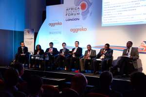 Speakers take part in a panel discussion at the Africa Energy Forum 2016 in London