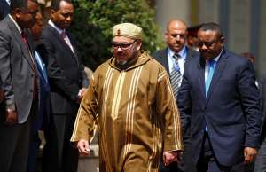 King Mohammed VI of Morocco, (L) walks with Ethiopia’s Prime Minister Hailemariam Desalegn. Reuters/Tiksa Negeri