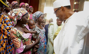 Photo: Premium Times President Muhammadu Buhari with released Chibok girls in October 2016 (file photo).