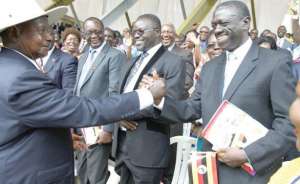 Photo: Daily Monitor President Museveni with former FDC presidential candidate Kizza Besigye (file photo).