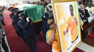 Pallbearers carry the coffin of Ivorian football star Cheick Tiote during his funeral ceremony in Abidjan.