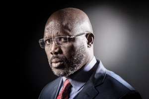 Liberian football hero George Weah is a frontrunner in next Tuesday's presidential elections (AFP Photo/JOEL SAGET)