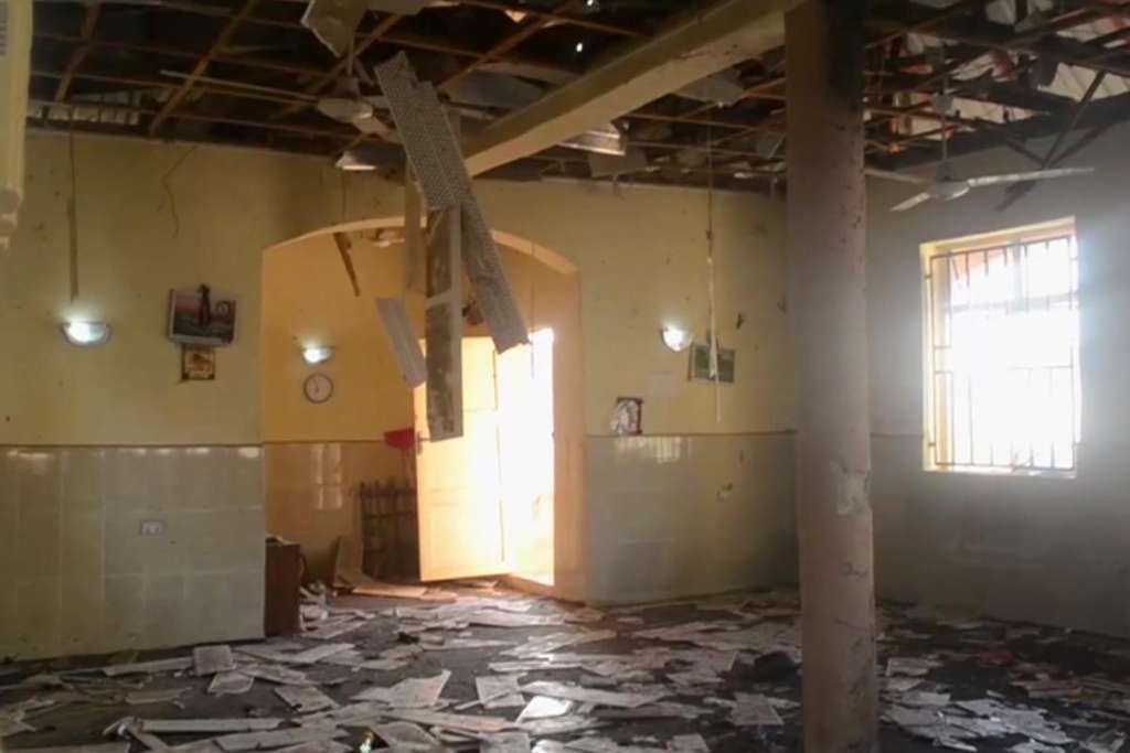 This image taken from TV, shows the interior of a mosque after a deadly attack by a suicide bomber, in Mubi, Adamawa State, Nigeria, Tuesday Nov. 21, 2017. A teenage suicide bomber detonated as worshippers gathered for morning prayers at a mosque in northeastern Nigeria, killing at least 50 people, police said Tuesday, in one of the region's deadliest attacks in years. (AP Photo)