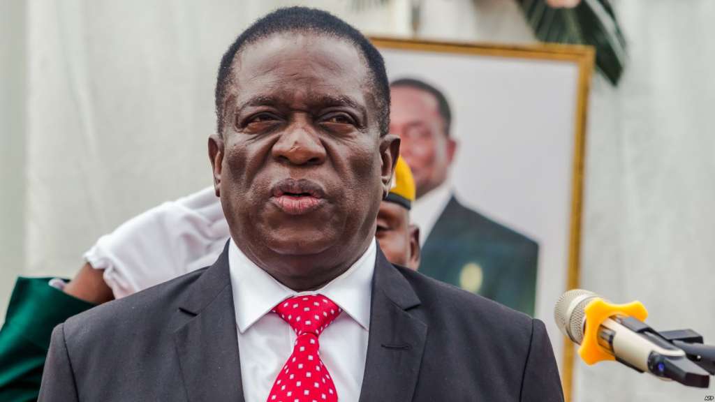 Zimbabwe's new President Emmerson Mnangagwa presides over a swearing in ceremony as his new cabinet took office on Dec. 4, 2017 at State House in Harare.