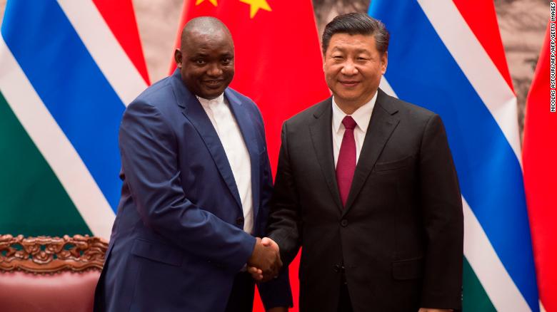 Gambia's President Adama Barrow with China's President Xi Jinping at the end of a signing ceremony at the Great Hall of the People in Beijing on December 21, 2017. The two countries re-established diplomatic relations in 2016.