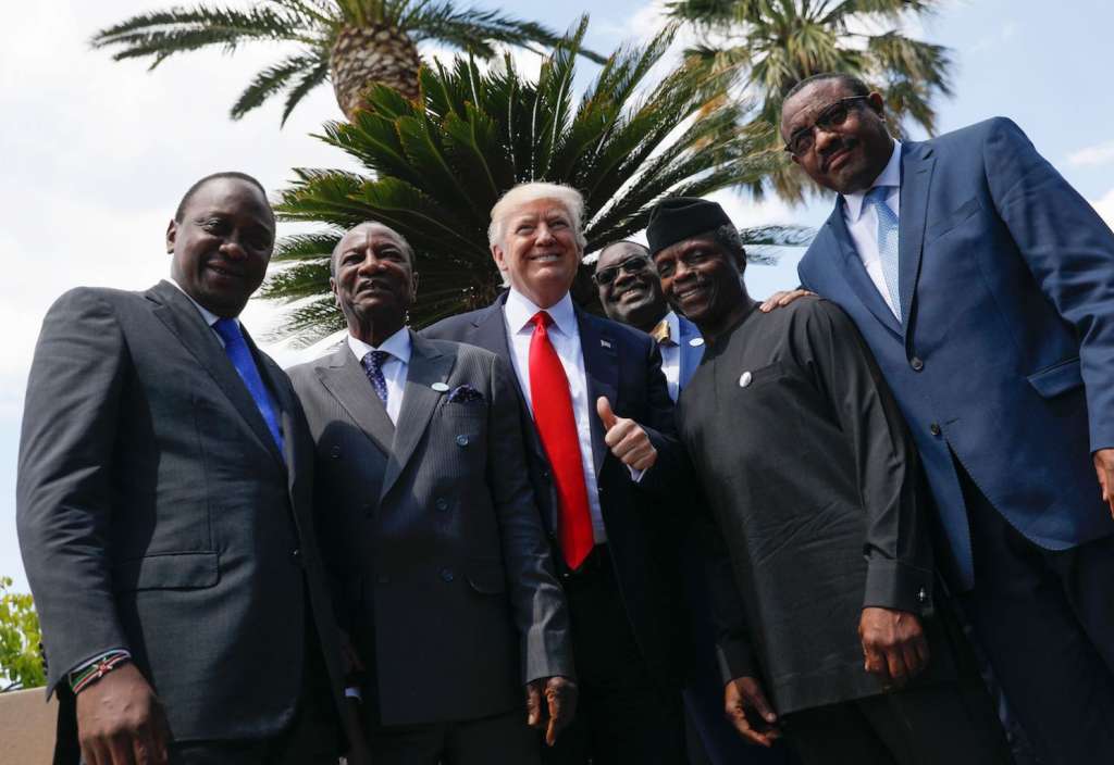 (L-R) Kenya's President Uhuru Kenyatta, Guinea's President Alpha Conde, US President Donald Trump, African Development Bank President Akinwumi Adesina, Vice President of Nigeria Yemi Osinbajo and Ethiopian Prime Minister Hailemariam Desalegn pose following a family photo of G7 leaders with African leaders after an expanded session at the Summit of the Heads of State and of Government of the G7, the group of most industrialized economies, plus the European Union, on May 27, 2017 in Taormina, Sicily.  / AFP PHOTO / POOL / JONATHAN ERNST        (Photo credit should read JONATHAN ERNST/AFP/Getty Images)