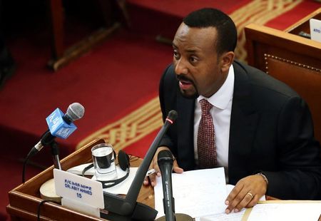 Ethiopia's newly elected Prime Minister Abiy Ahmed addresses the members of parliament inside the House of Peoples' Representatives in Addis Ababa, Ethiopia April 19, 2018. REUTERS/Tiksa Negeri