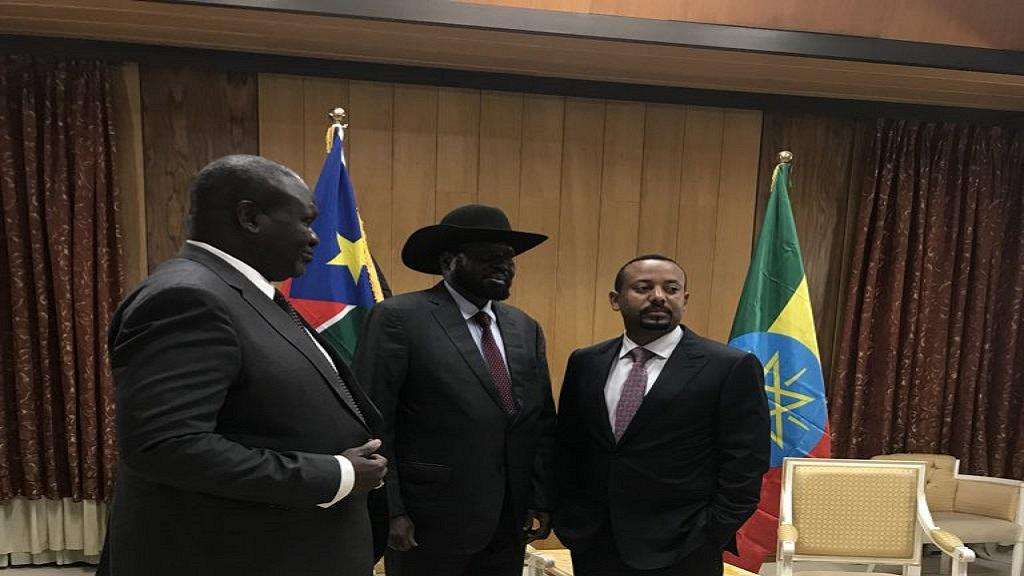  South Sudan’s President Salva Kiir (centre), his former deputy-turned-rebel leader Riek Machar (left) and Ethiopia’s Prime Minister Abiy Ahmed during their meeting in Addis Ababa, Ethiopia. Photo/AFP