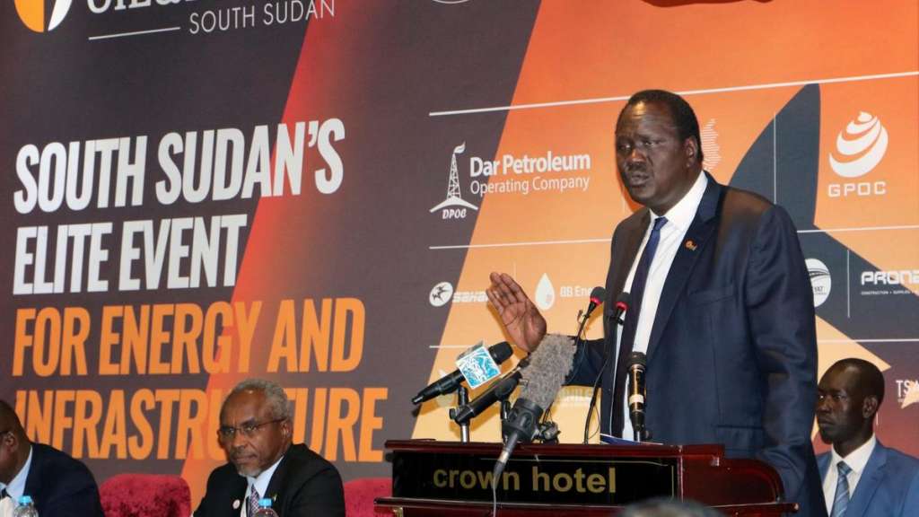 South Sudan's petroleum minister Ezekiel Gatkuoth welcomes potential investors during the second Africa Oil and Power conference in Juba. AP 